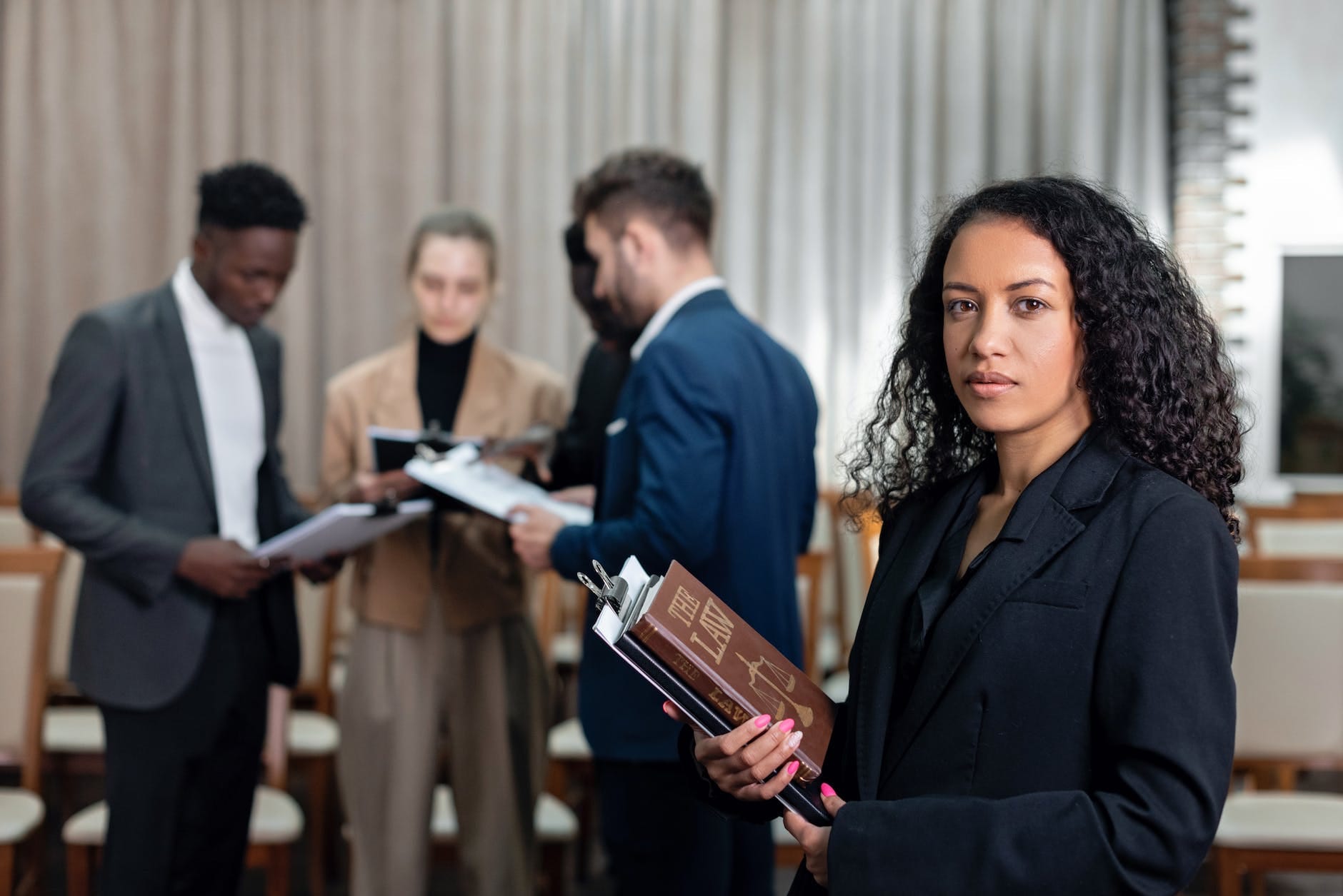 Insurance agent 6 people having a deal in the office